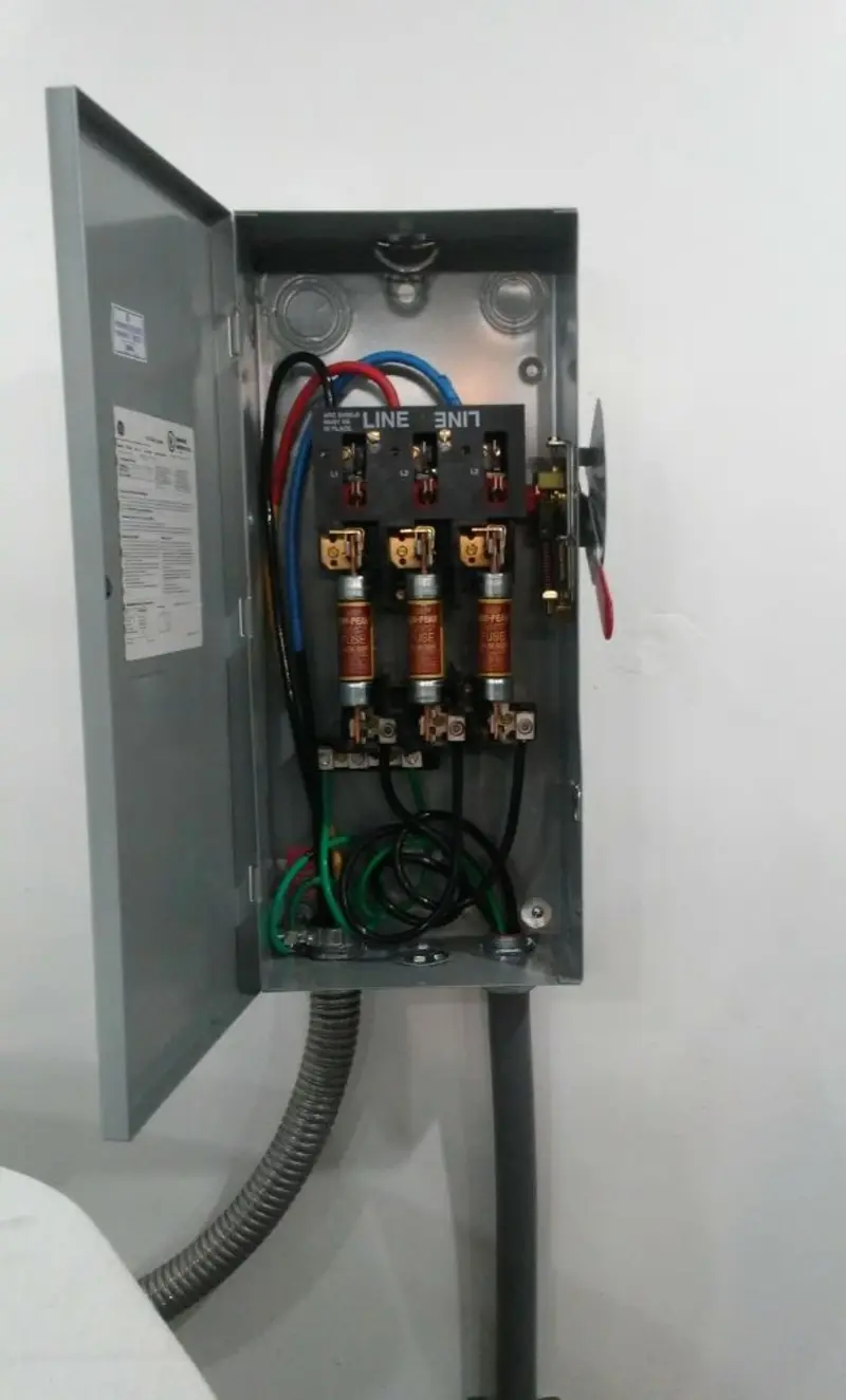 Three-phase disconnect switch installed for Smoke Detector Installation in Humble